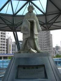 「梅川」の像